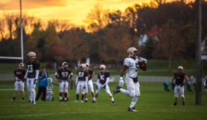 Rich Sodeke, '15, practices at Whitehead Football Practice Fields on Wednesday, Oct. 29, 2014. 