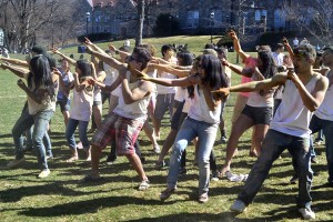 People dance on the UC Lawn during the Holi celebration last year on Sunday, April 6, 2014. This year's Holi celebration will be held on Sunday, April 19, 2015. (Brishty Khossein/B&W photo)