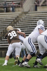 Senior linebacker Noah Robb gets into the backfield and tackles a Yale University player on Saturday, October 3, 2015 at Goodman Stadium. Lehigh lost to Yale 27-12. (Austin Vitelli/B&W Staff)