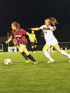  Freshman forward Amanda Marques attempts to steal the ball from Lafayette midfielder junior Joanna Scotti on Wednesday, Oct. 21, 2015. Lehigh won the game 1-0 in the 103rd minute (Courtney Ferszt/B&W Photo)