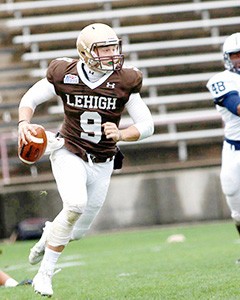 Junior quarterback Nick Shafnisky looks to throw a pass in a game against Yale University on Saturday, Oct. 3, 2015. Lehigh lost the game 27-12. (Gaby Morera/ BW Staff)