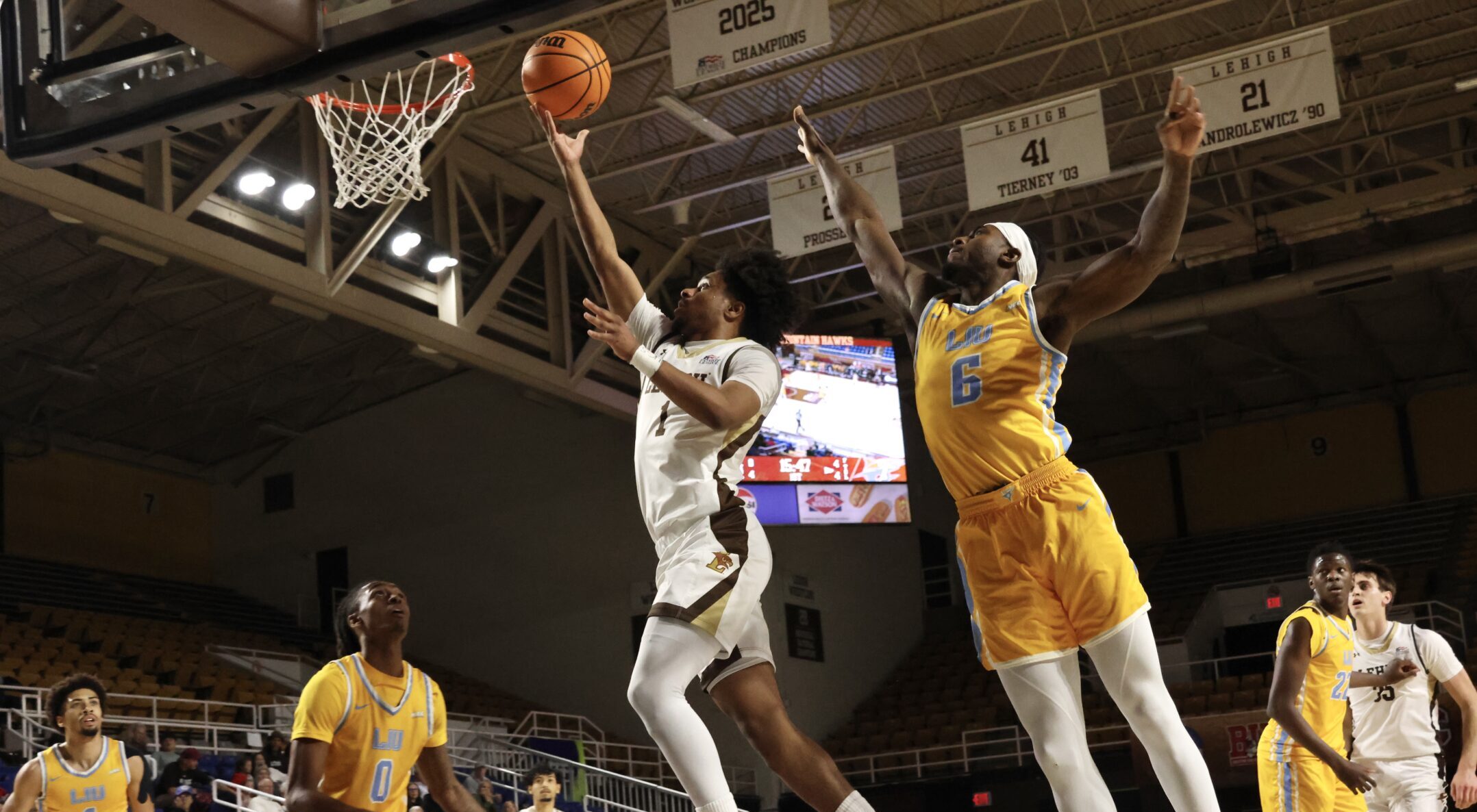 Nasir Whitlock reaches 1,000 career points in men’s basketball win over American