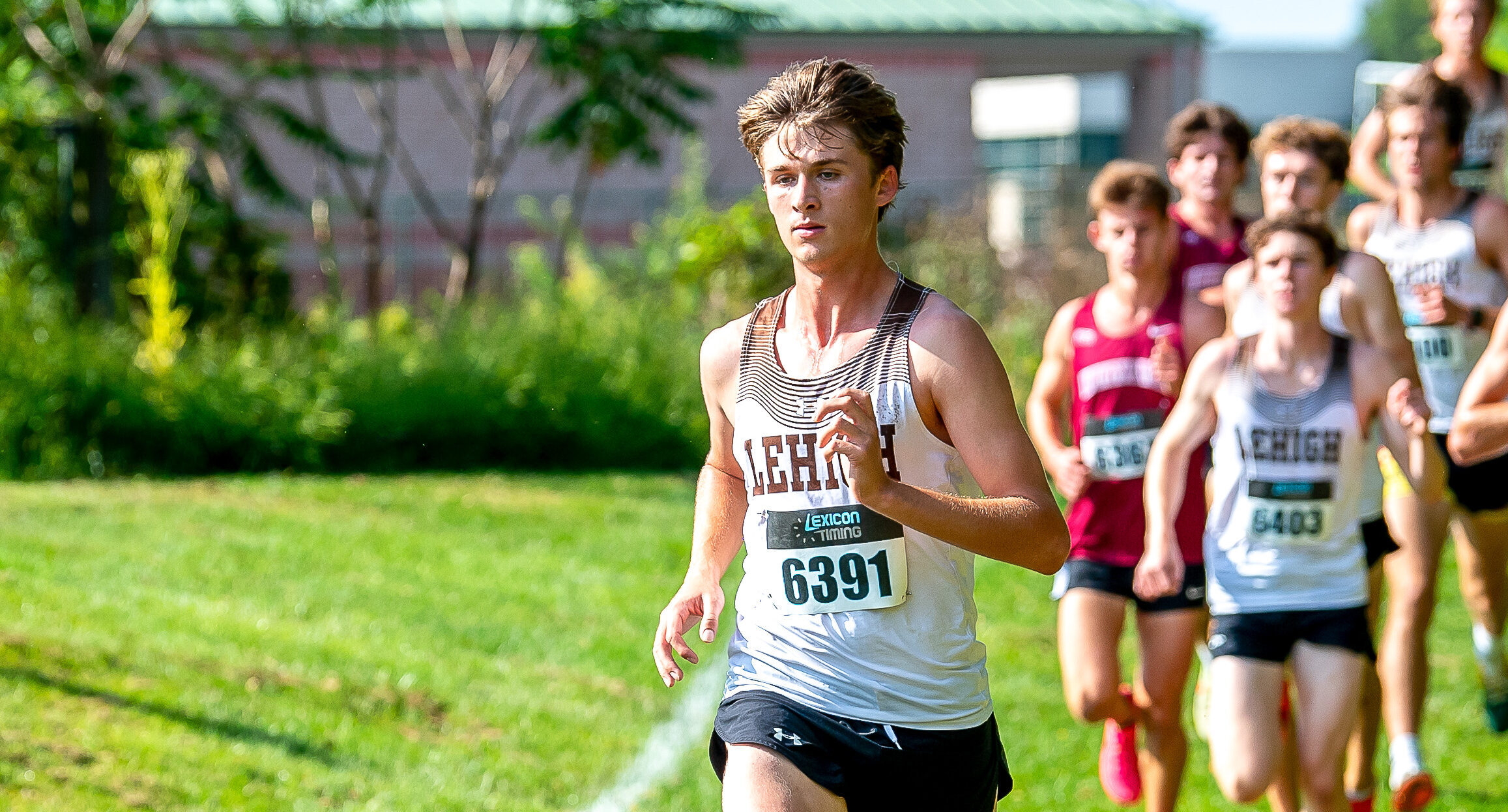 Thomas Arnold runs the distance across the track, around the world